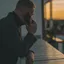 A person on the phone at dusk, leaning on a railing above a city