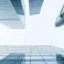 Glass office towers photographed from street level looking up