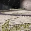 An architectural scale model of a city laid out under gallery lighting