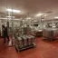 Stainless-steel tanks and pipes inside a modern dairy processing plant