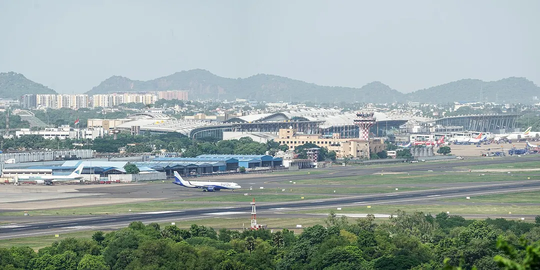 A panoramic view of Chennai International Airport's runway and terminals from St Thomas Mount