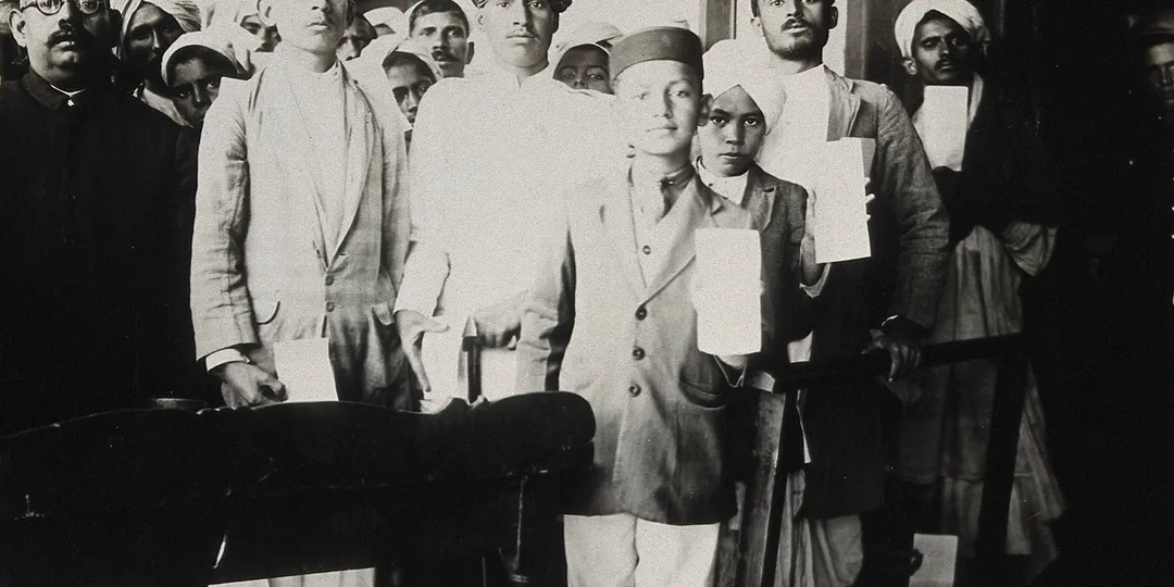 Patients holding treatment cards while awaiting rabies inoculation at the Pasteur Institute Hospital in Kasauli around 1910