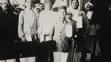 Patients holding treatment cards while awaiting rabies inoculation at the Pasteur Institute Hospital in Kasauli around 1910