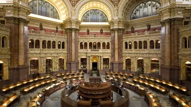 The domed main reading room of the Library of Congress, ringed with desks