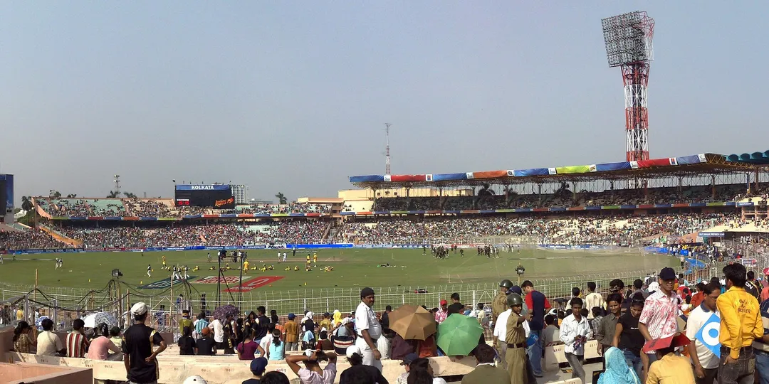 A packed cricket stadium crowd at Eden Gardens, Kolkata